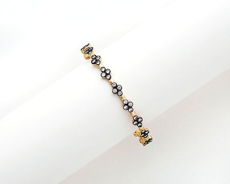 GOLD HEM FLOWER BANGLE